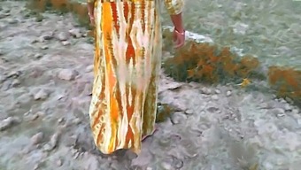Indian Village Housewife And Husband Filmed Outdoors