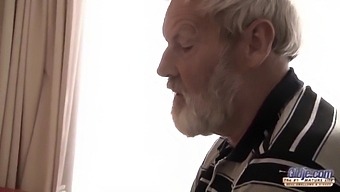 Grandfather With A Large Penis Is Pleasured By A Young Woman Who Gives Him A Blowjob
