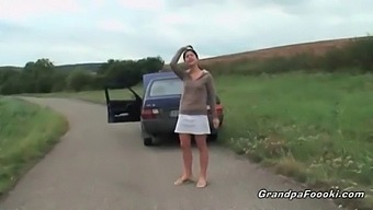 Teenager Entices Elderly Man In Outdoor Setting