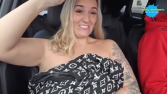 Outdoor Striptease On A Vehicle Roof In Daytime