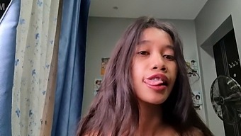 A Petite Asian Girl Is Featured In The Video