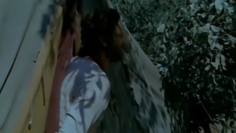 A Married Woman Engages In An Adulterous Encounter With A Black Man, While Her Unsuspecting Husband Watches From The Bushes.